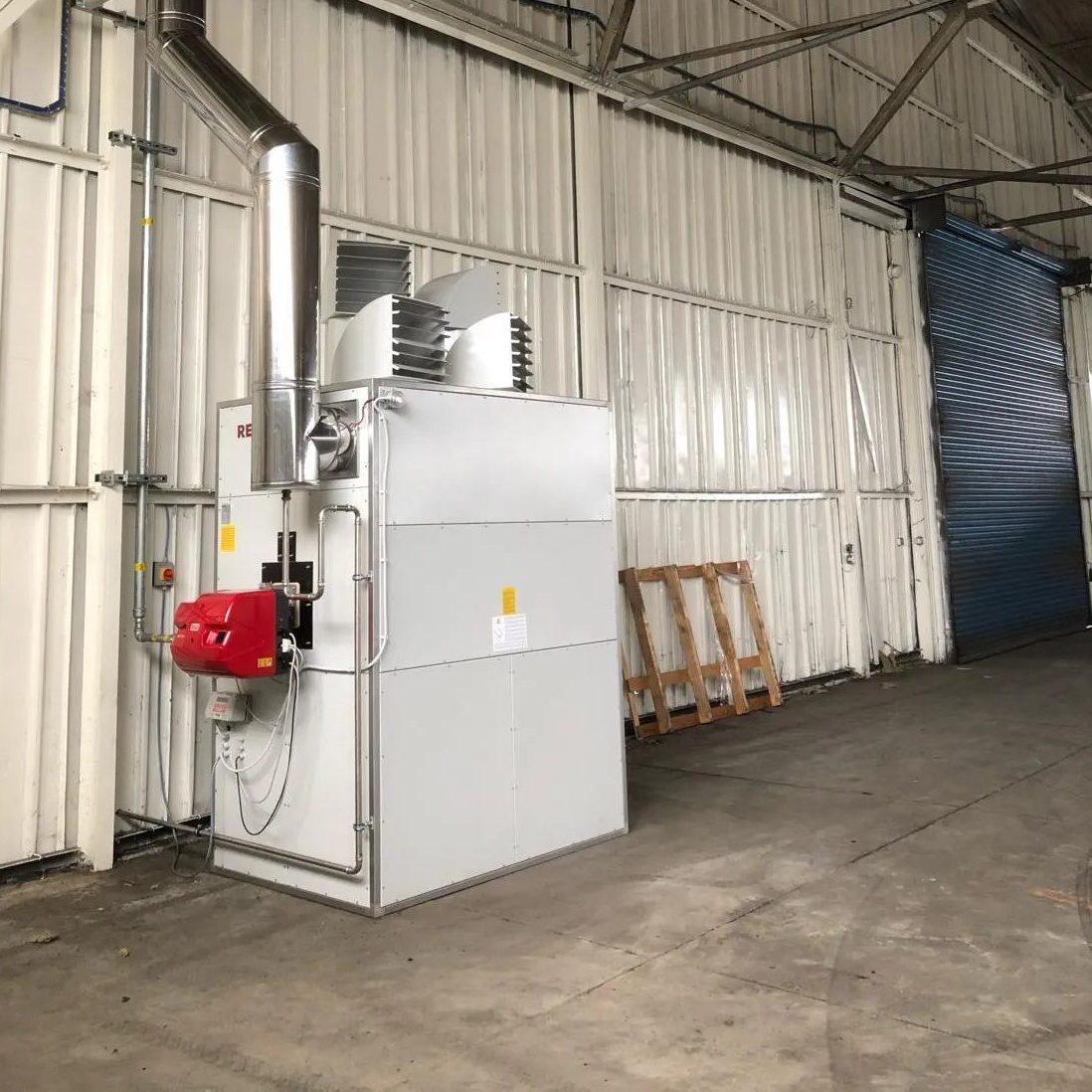 Cabinet heater installation in a warehouse